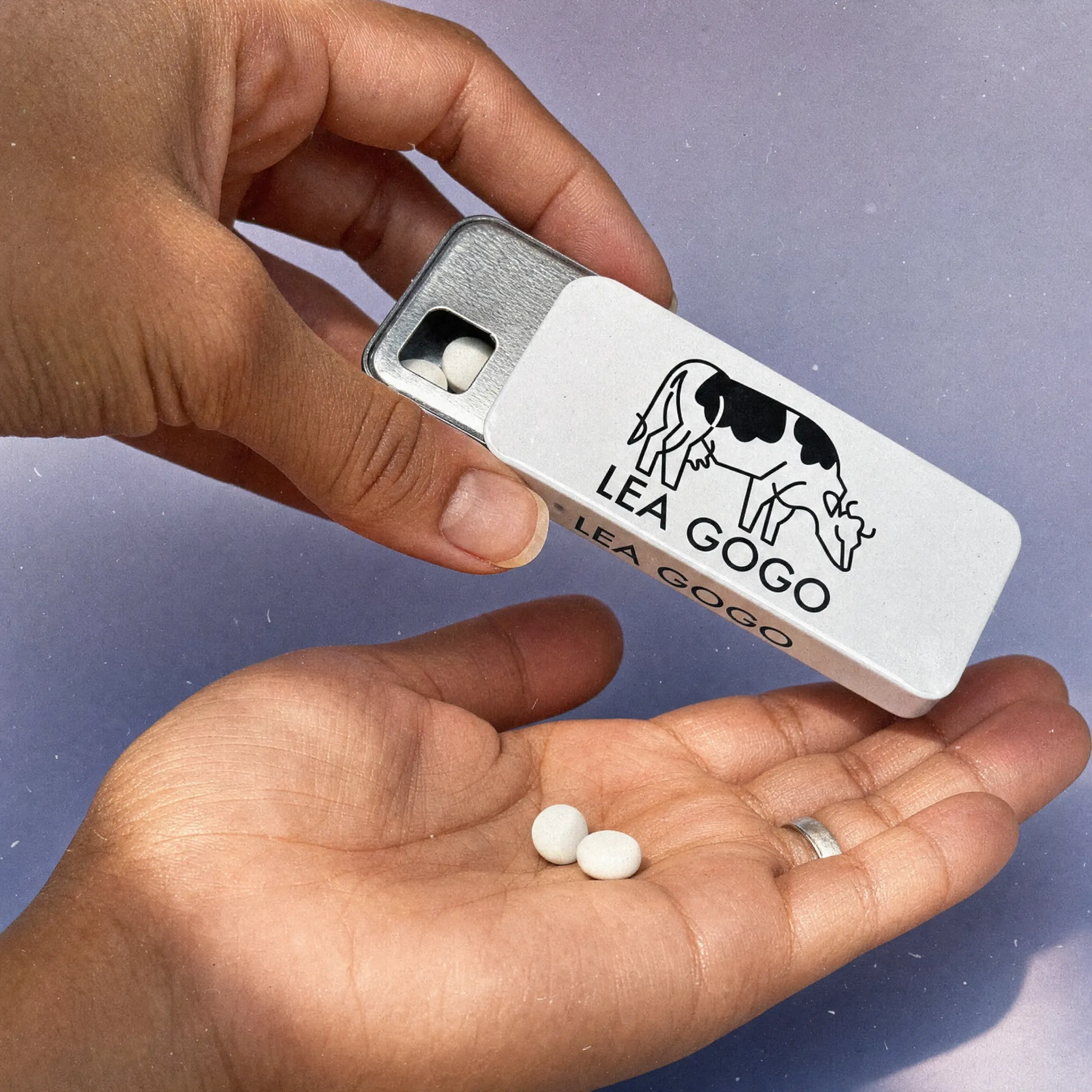 Lea Gogo lactase tablets poured into a palm